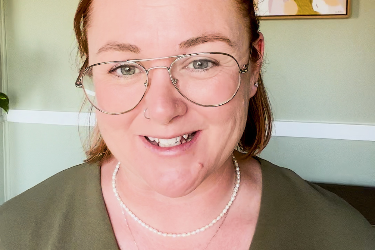 Bev smiles at the camera